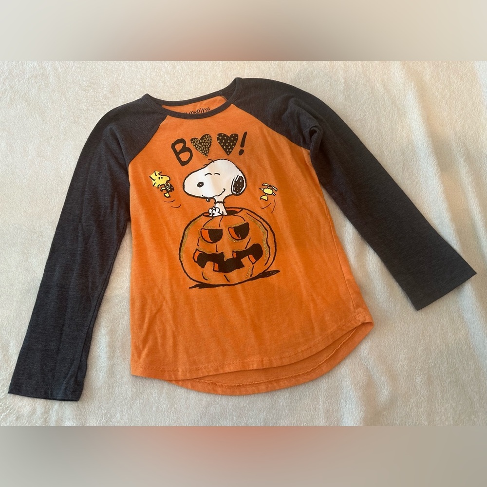 Girls’ Snoopy Halloween long sleeve tee from Jumping Beans, size 7.